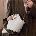 Elegant Beige Bucket Bag. Golden Lock & Adjustable Strap.