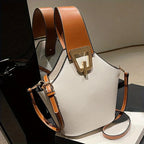 Elegant Beige Bucket Bag. Golden Lock & Adjustable Strap.
